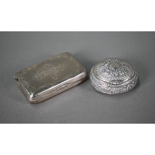 27 - A 19th century oval silver snuff box with floral chased decoration in the Indian manner, Glasgow Imp... 