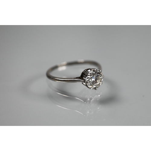 273 - A single stone diamond solitaire ring, white metal set, diamond approx 1ct, size L, to/w a full eter... 