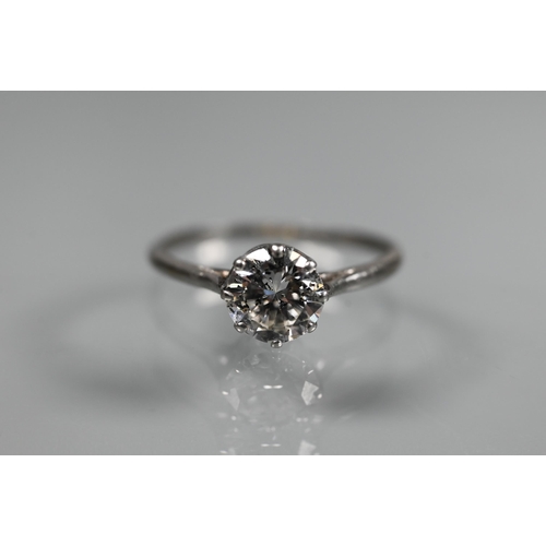 273 - A single stone diamond solitaire ring, white metal set, diamond approx 1ct, size L, to/w a full eter... 