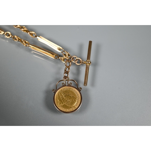 278 - A 9ct fancy link Albert chain with bar and two swivels suspending double-sided locket and with 1896 ... 