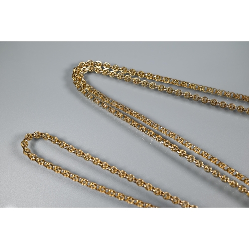 283 - A 9ct yellow gold fancy link guard chain with tassel fob and watch key attached, approx 47.9g all in