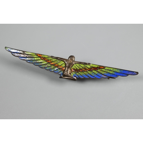 294 - An Art Deco Egyptian Revival enamelled brooch in the form of a winged pharoah, 9cm wide to/w an Edwa... 