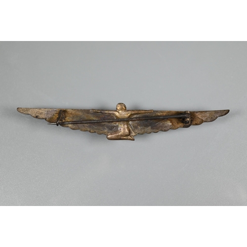 294 - An Art Deco Egyptian Revival enamelled brooch in the form of a winged pharoah, 9cm wide to/w an Edwa... 