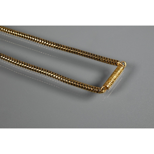 318 - A yellow metal snake-link necklace with engraved cylindrical clasp, unmarked, approx 16g