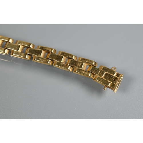 320 - A yellow metal Greek key link bracelet, stamped 585, approx 18.2g