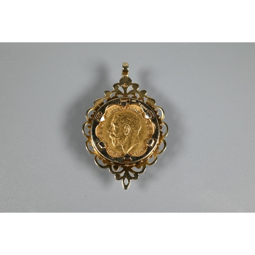 333 - A George V gold sovereign dated 1913 in 9ct yellow gold scroll pendant mount to/w one pound 'Nelson'... 