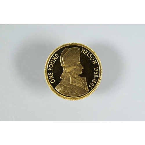 333 - A George V gold sovereign dated 1913 in 9ct yellow gold scroll pendant mount to/w one pound 'Nelson'... 