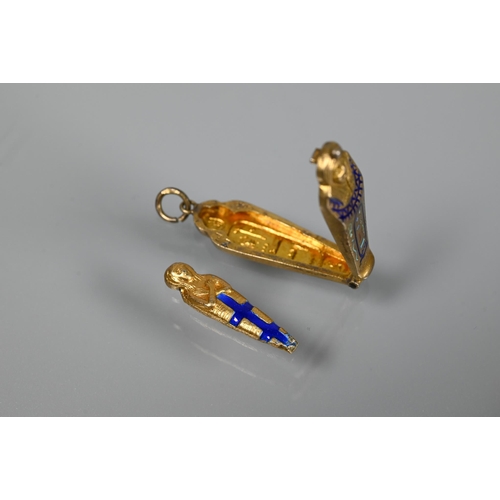 339 - A propelling pencil in the form of a gilt metal and enamel sarcophagus, 3 cm long; a smaller sarcoph... 