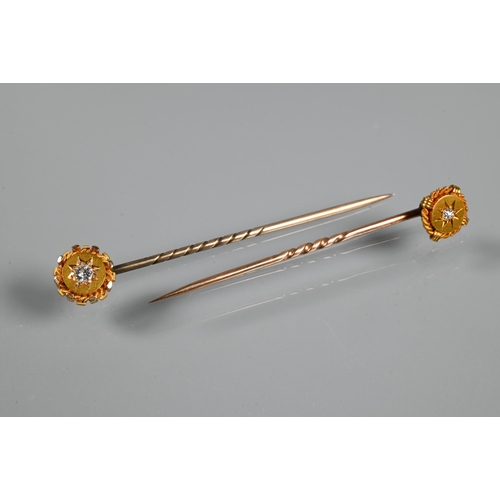 342 - Two Edwardian 15ct yellow gold stick pins, each with inset diamond, 3.4g all in (2)