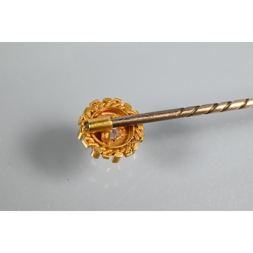 342 - Two Edwardian 15ct yellow gold stick pins, each with inset diamond, 3.4g all in (2)