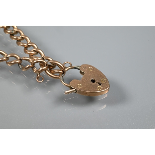 351 - A 9ct rose gold curb bracelet with padlock attached, approx 6.5g