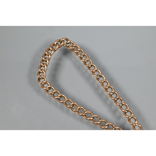 351 - A 9ct rose gold curb bracelet with padlock attached, approx 6.5g