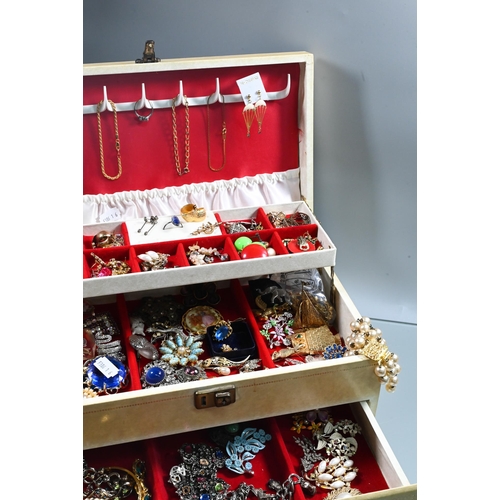 370 - Jewel box containing large collection of vintage costume jewellery mainly comprising earrings and br... 