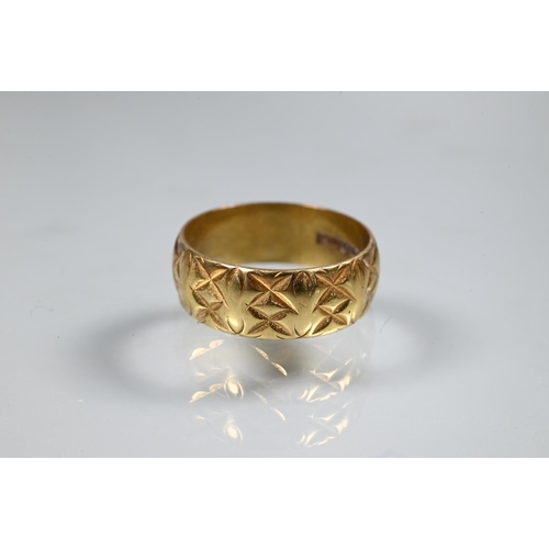 375 - An 18ct yellow gold wedding band with faceted decoration, size O; an 18ct yellow gold cluster ring s... 