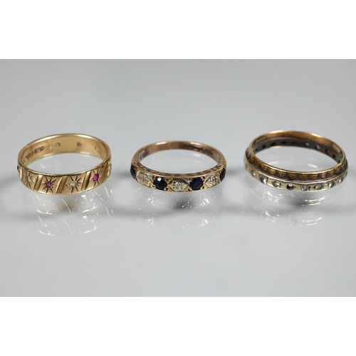 376 - A collection of 9ct rings including wide wedding band size T, 9.2g, sapphire and diamond set half et... 