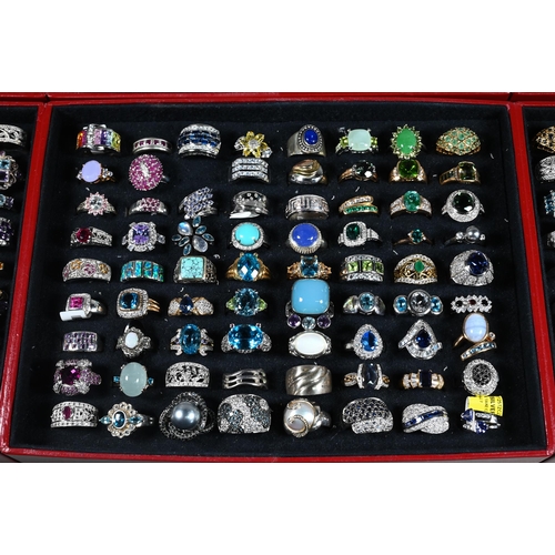 379 - Two jewel cases - one containing a large quantity of various simulated and synthetic gem-set rings, ... 