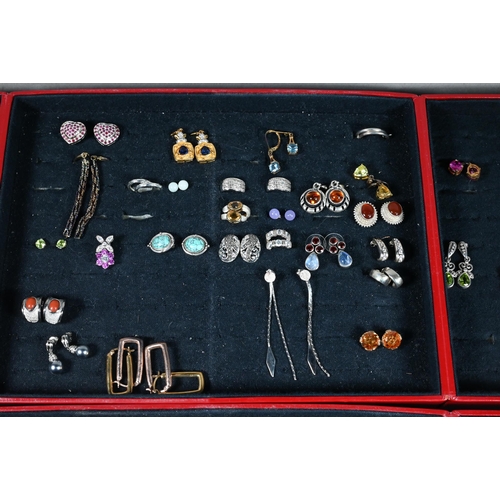 379 - Two jewel cases - one containing a large quantity of various simulated and synthetic gem-set rings, ... 