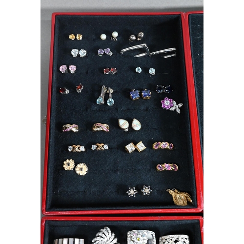 379 - Two jewel cases - one containing a large quantity of various simulated and synthetic gem-set rings, ... 