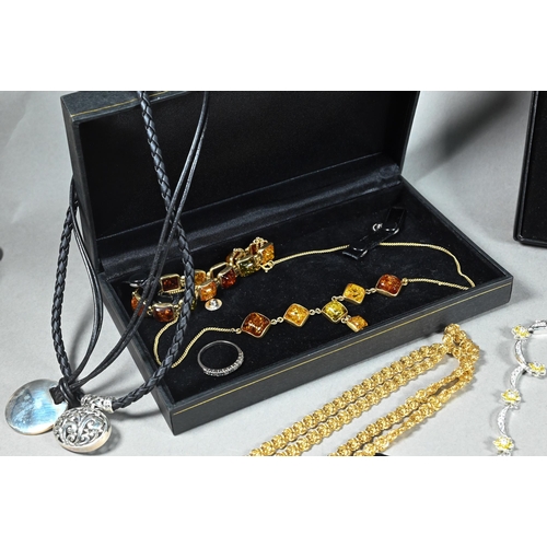 382 - Two boxes of assorted jewellery items including suites of simulated and synthetic gem set necklaces,... 