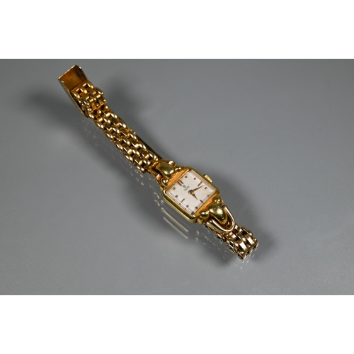 404 - A Tudor 14k ladies wrist watch, the 15 mm case with champagne dial, 28.8g all-in (no box/documents) ... 