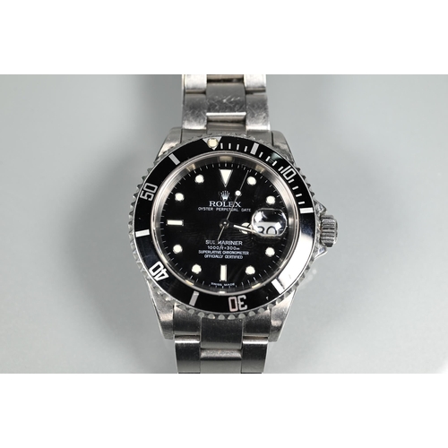 406 - A Gents Rolex Oyster Perpetual Date Submariner - to 1000ft / 300m, boxed with all papers no.160-F371... 