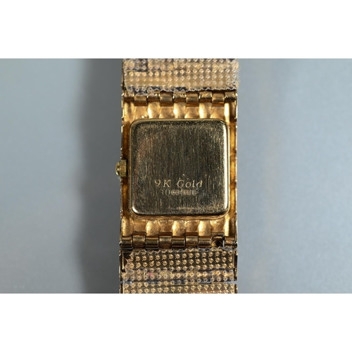 407 - A Rotary 9ct gold ladies wrist watch, white square dial, 28.5g all-in (quartz movement)