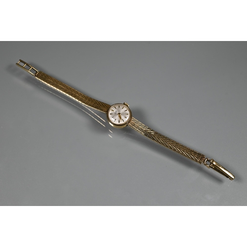 409 - A Tudor 9ct gold ladies wrist watch, champagne dial (approx. 17.1g)