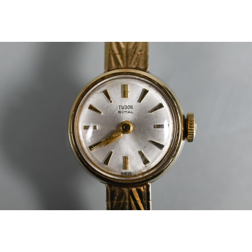 409 - A Tudor 9ct gold ladies wrist watch, champagne dial (approx. 17.1g)