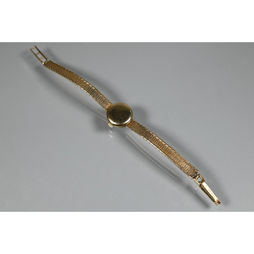 409 - A Tudor 9ct gold ladies wrist watch, champagne dial (approx. 17.1g)