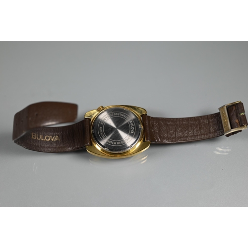 412 - A Bulova Accutron gents wrist watch, the gilt steel case with quartz movement, the gilt dial with da... 