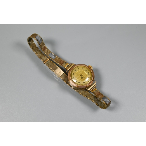 417 - An Ingersoll ladies gilt cased wristwatch to/with an unbranded vintage wristwatch and a Limit fob wa... 