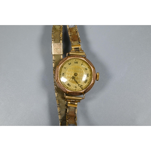 417 - An Ingersoll ladies gilt cased wristwatch to/with an unbranded vintage wristwatch and a Limit fob wa... 