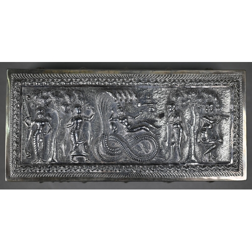42 - An Indian silver cigarette box, richly embossed and chased with figures, the cover depicting Vishnu ... 