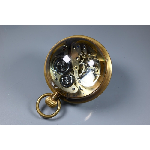 424 - A Victorian style goliath ball desk clock, the white dial with part enamelled Arabic hour markers, a... 