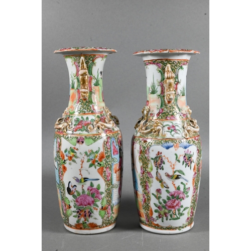 430 - A pair of 19th century Chinese Canton famille rose baluster vases with everted foliate rims, applied... 