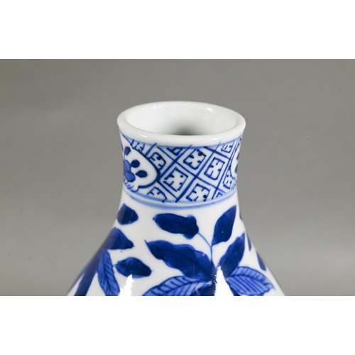 431 - A 19th/20th century Chinese blue and white double gourd vase painted with two sinuous dragons amongs... 