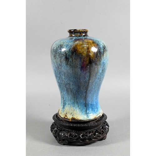 433 - A Chinese Junyao style meiping vase, the exterior covered in a thick striated opaque blue glaze with... 