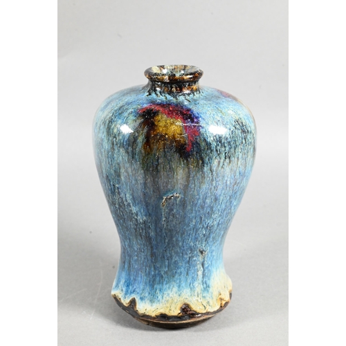 433 - A Chinese Junyao style meiping vase, the exterior covered in a thick striated opaque blue glaze with... 