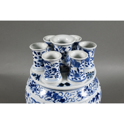 435 - A 19th century Chinese blue and white tulip vase (tulipiere) with seven spouts, painted in tones of ... 