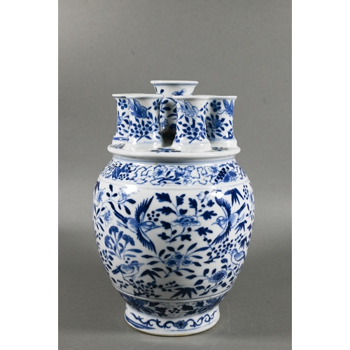 435 - A 19th century Chinese blue and white tulip vase (tulipiere) with seven spouts, painted in tones of ... 