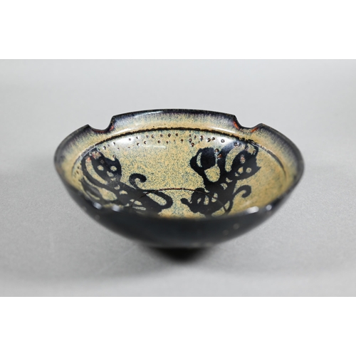 442 - A Chinese Southern Song style Jizhou stoneware bowl, the interior with three paper-cut monkeys reser... 