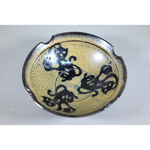 442 - A Chinese Southern Song style Jizhou stoneware bowl, the interior with three paper-cut monkeys reser... 