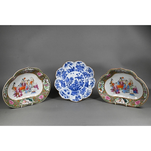 444 - A pair of 19th century Chinese famille rose ruyi-shaped dishes, painted in Canton palette polychrome... 