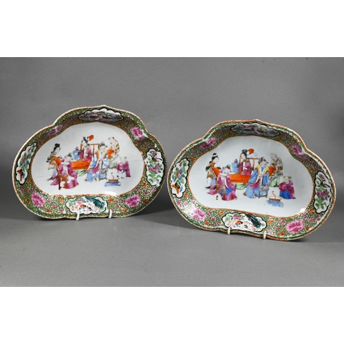 444 - A pair of 19th century Chinese famille rose ruyi-shaped dishes, painted in Canton palette polychrome... 