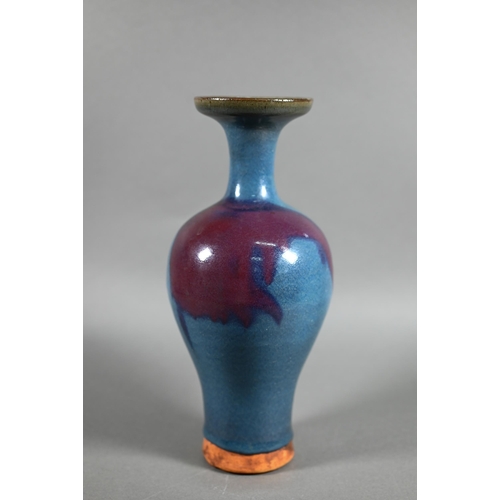 452 - A Chinese Jun Yao style baluster vase evenly covered with a crackled turquoise glaze with large irre... 