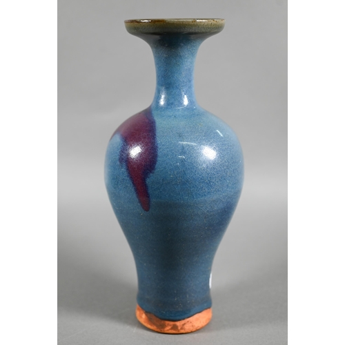 452 - A Chinese Jun Yao style baluster vase evenly covered with a crackled turquoise glaze with large irre... 