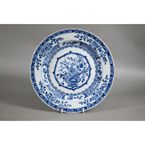 456 - A pair of 18th century Chinese blue and white plates painted with floral design in tones of undergla... 