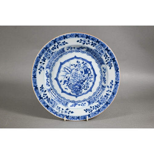 456 - A pair of 18th century Chinese blue and white plates painted with floral design in tones of undergla... 