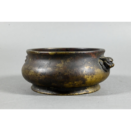 459 - An 18th/19th century Chinese gilt bronze censer or compressed globular form on circular foot cast wi... 