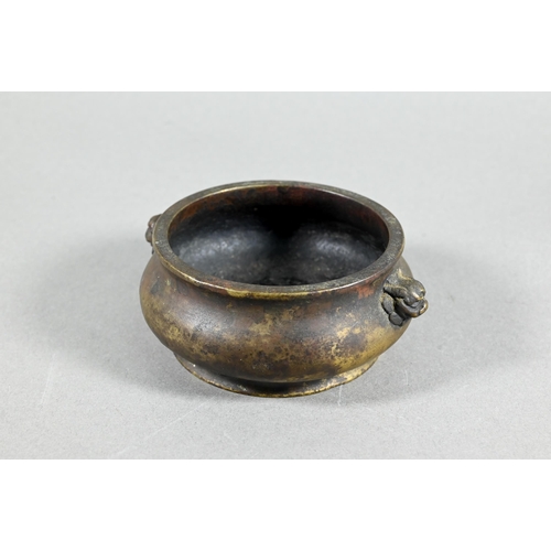 459 - An 18th/19th century Chinese gilt bronze censer or compressed globular form on circular foot cast wi... 